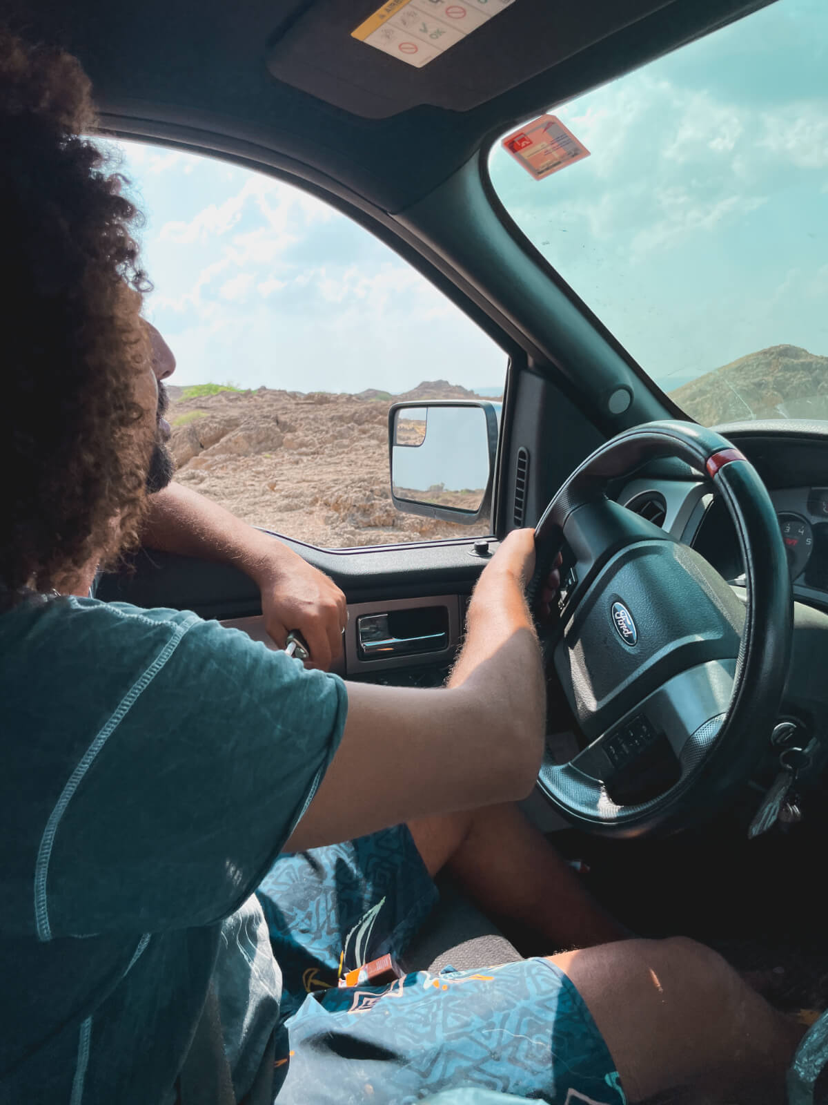 Mido driving our Ford Raptor through Saudi